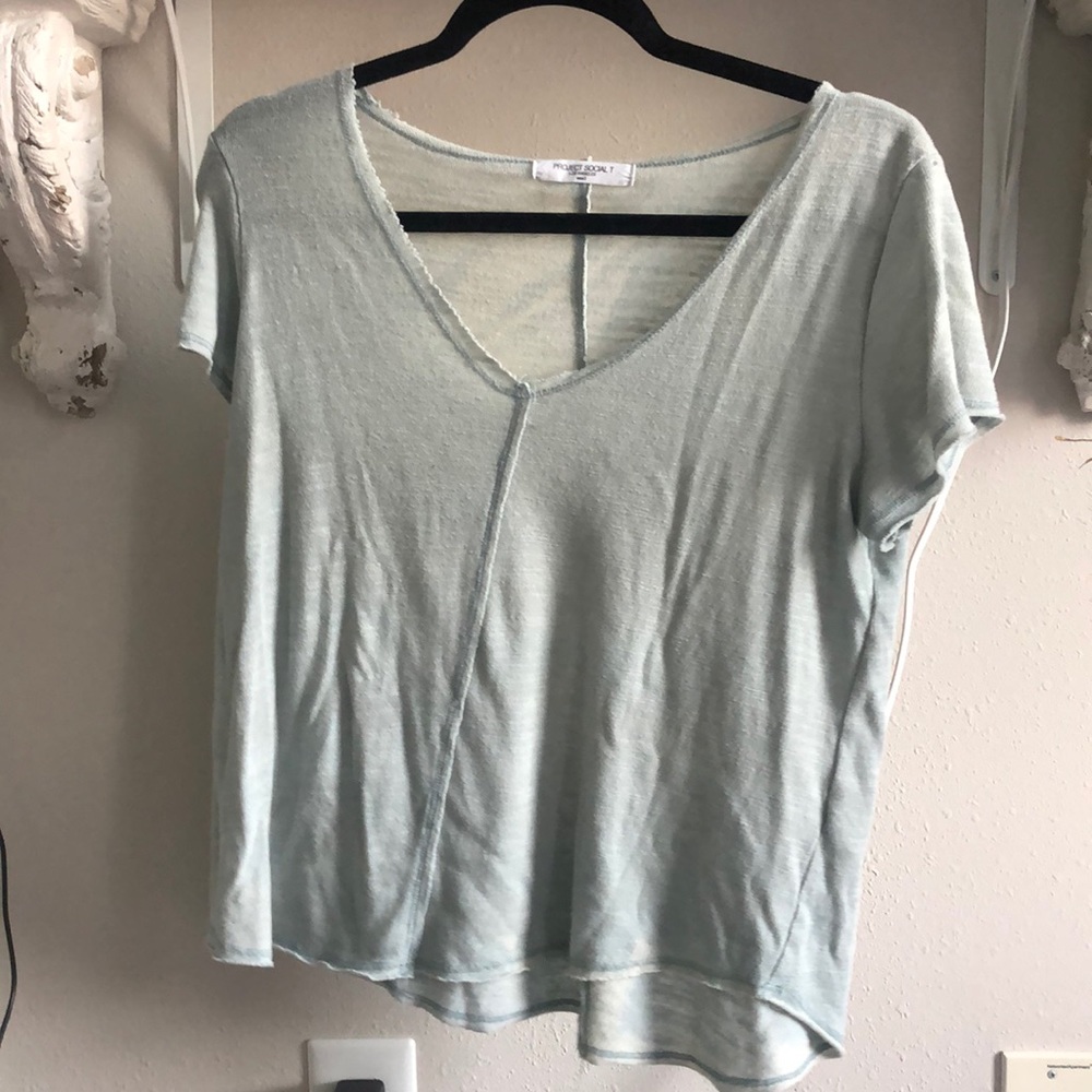 Project social T size small (fits like medium)